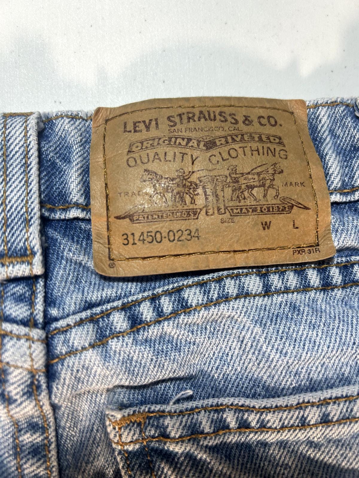 Vintage 90s Levis Paper Tag White Tab Light Wash Denim Pants Size 23